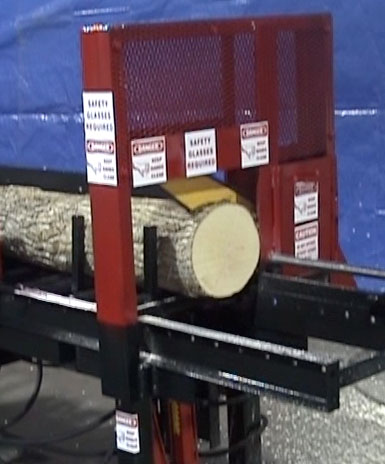 Electric Chain Bar Cut-Off Saw in use